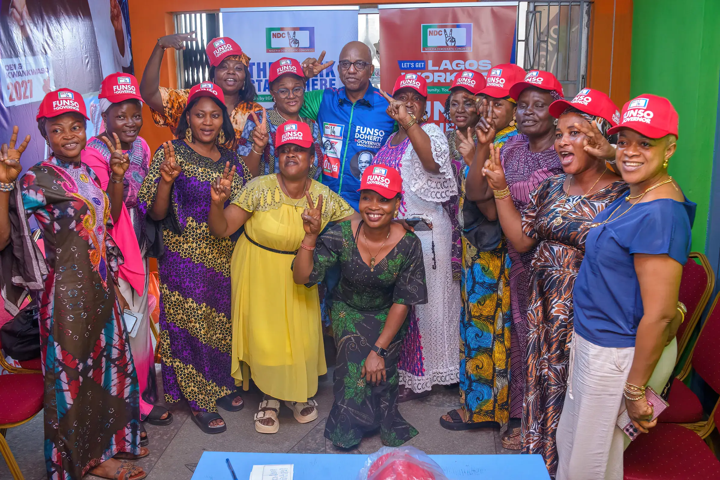 Funso Doherty with people during his visit to Alimosho.