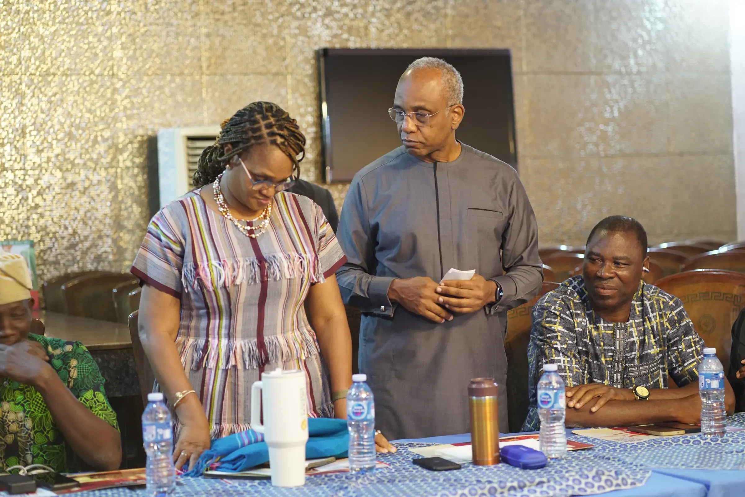 Funso Doherty with people at an NDC Lagos State executive meeting.