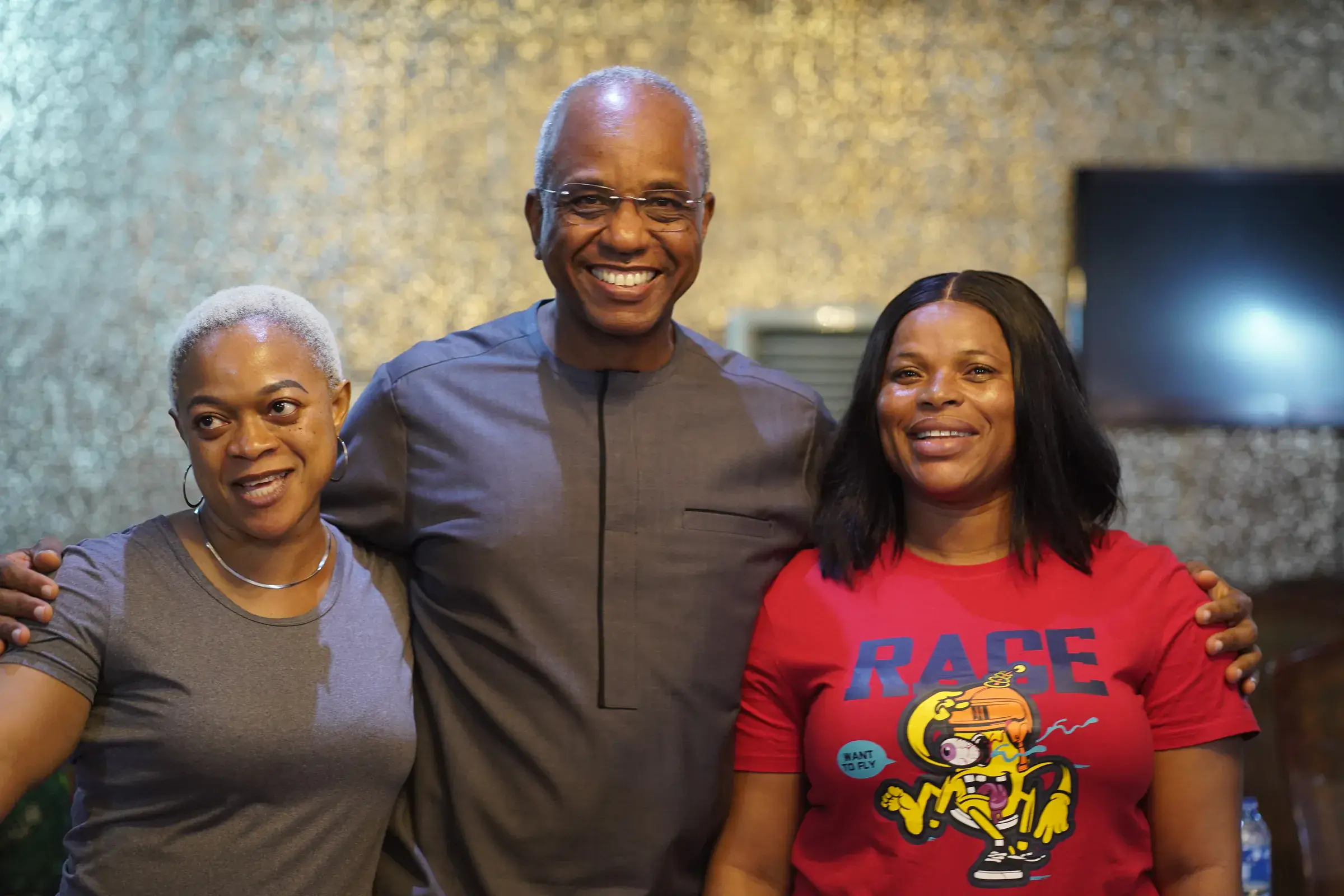 Funso Doherty with people at an NDC Lagos State executive meeting.